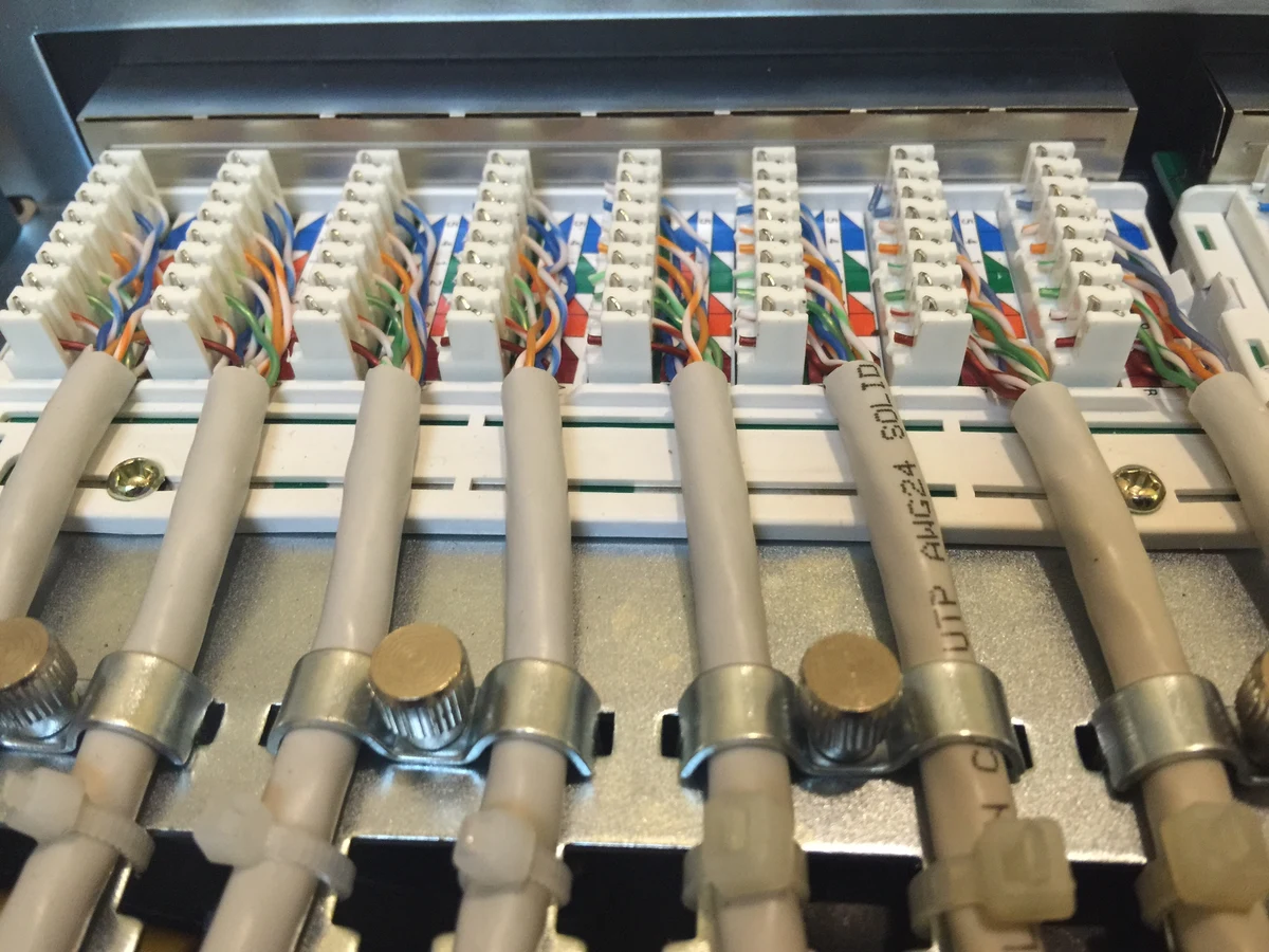 Close-up of neatly terminated twisted-pair cables in a patch panel